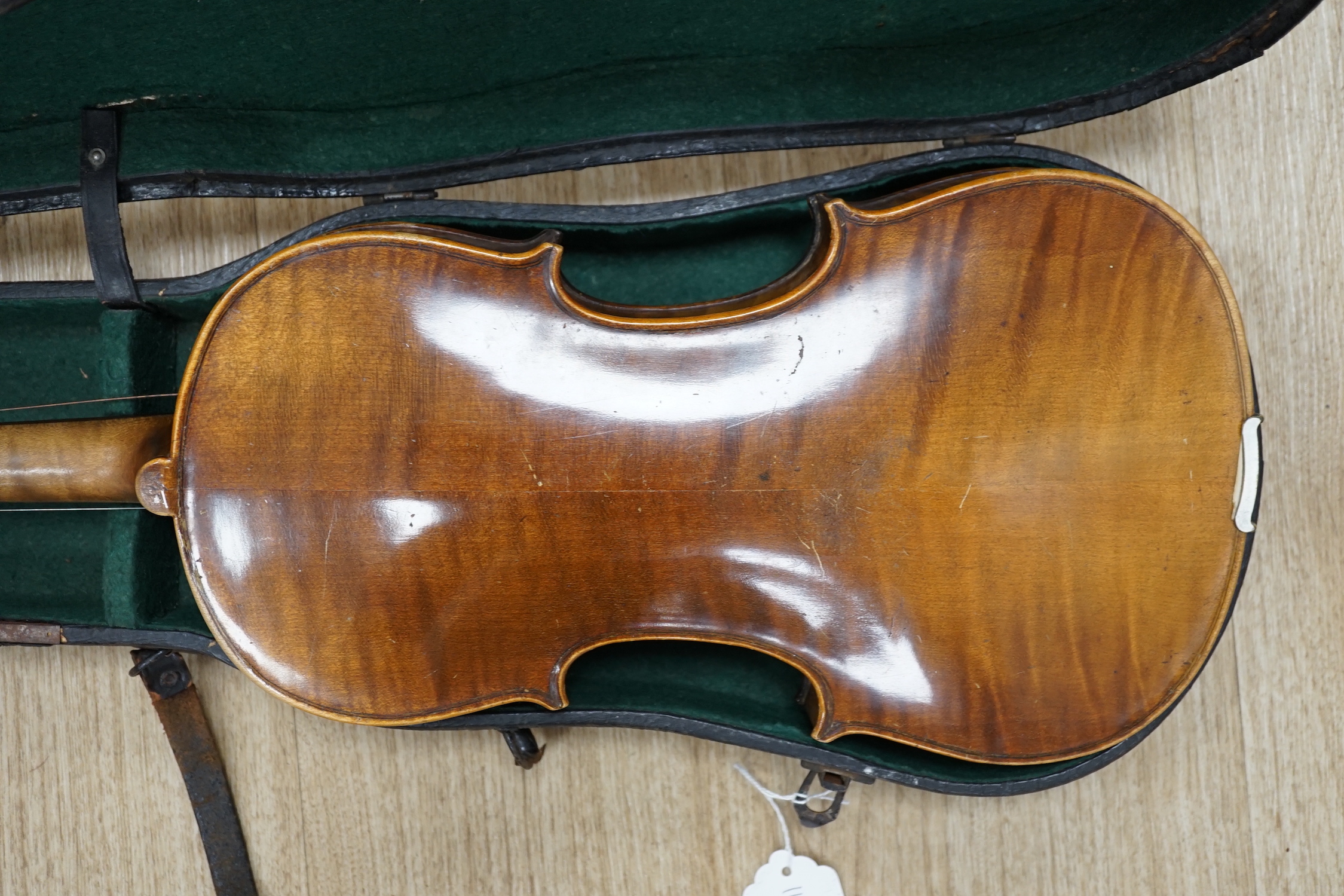 A cased early 20th century violin, length of body, 35.5cm, without bow